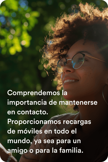 A smiling woman outdoors, with the words: We understand the importance of staying in touch. Providing mobile recharges globally Whether for a friend or family