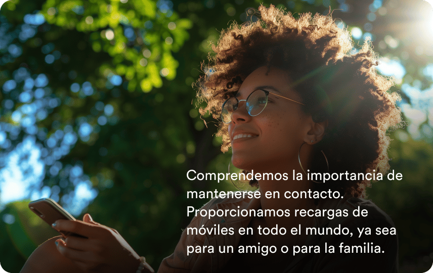 A smiling woman outdoors, with the words: We understand the importance of staying in touch. Providing mobile recharges globally Whether for a friend or family